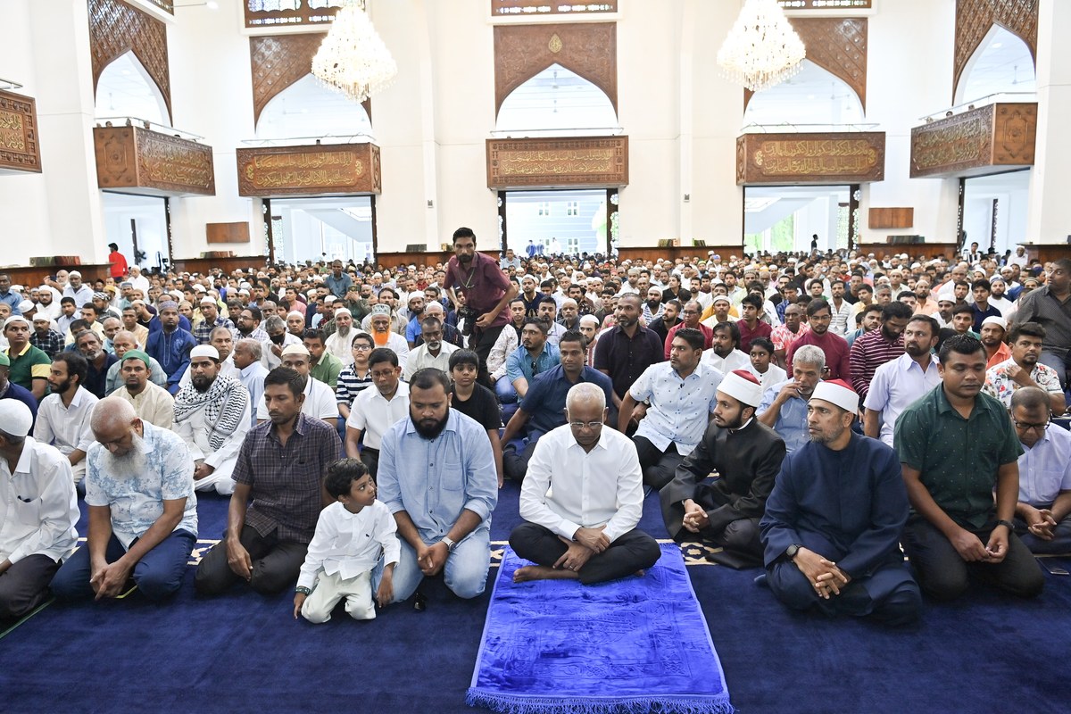 Worshippers gather for Eid al-Adha prayers inside the Islamic Centre in the Maldives