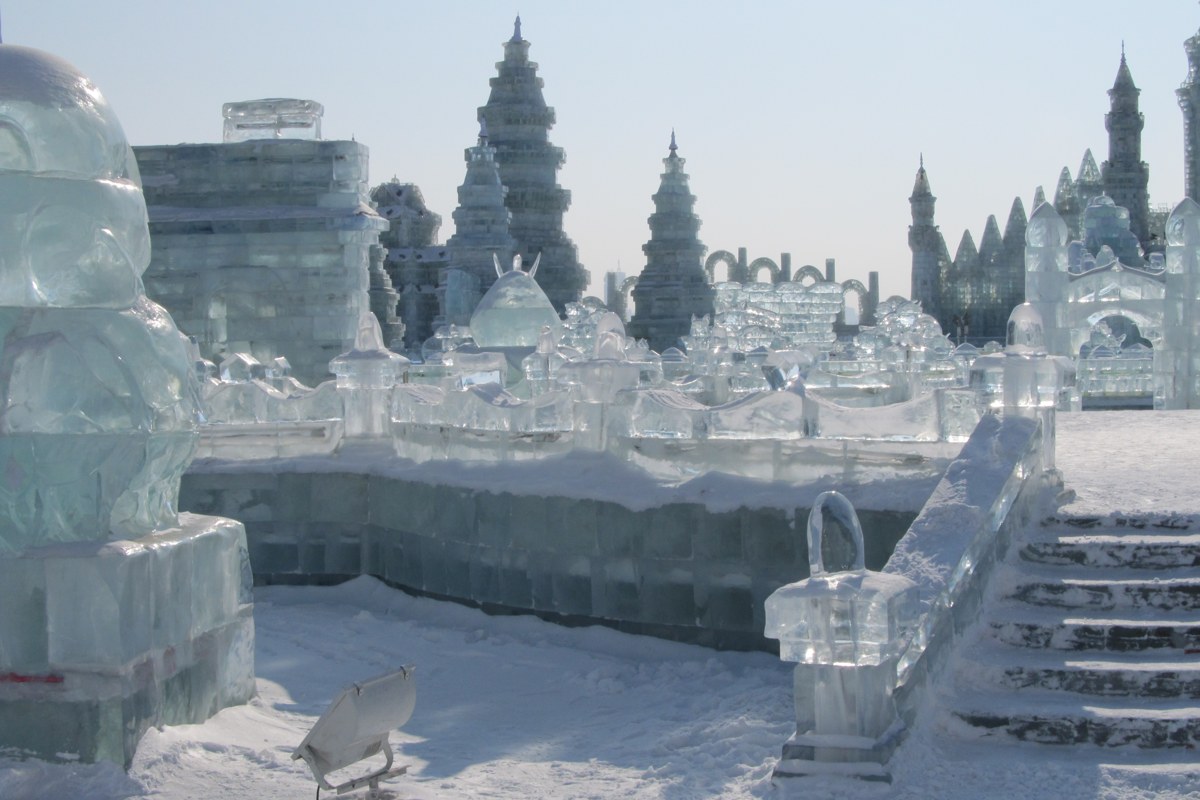 Towering ice sculptures and an ice palace at the Harbin Ice and Snow Festival in winter