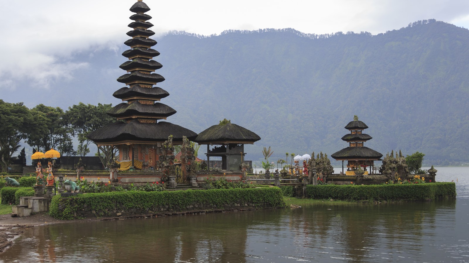 Pura Ulun Danu Beratan Temple on Lake Beratan, Bali, with mountains behind